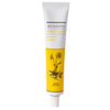 A white and yellow tube labeled Bioearth Pomata/Cream Arnica, featuring an illustration of an arnica plant on the front, highlights its soothing botanical properties. Tube is cylindrical with a matte finish; label has black and green sans-serif text. The product stands upright on a plain white background. No people or hands are present in the image.
