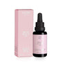 A pink box and a dropper bottle labeled Arctic Beauty Oil by Flow Cosmetics, described as antioxidant therapy oil for dry and aging skin, enriched with Nordic botanicals, 30ml size. The dropper bottle is transparent with a white cap; the label has clear sans-serif text. Both items are placed upright on a plain light background in a studio shot. No people or hands are visible.