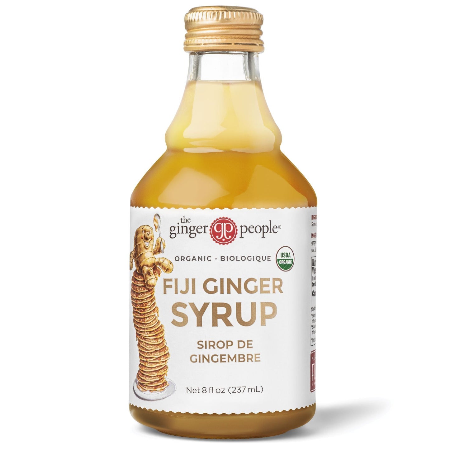 The Ginger People luomu inkiväärisiirappi; lieriön muotoinen, kirkas ja läpinäkyvä lasipullo kiiltäväpintaisella kultaisella kierrekorkilla; etusivun mattapintaisessa etiketissä inkiväärikuvitus ja luomusertifiointimerkki; antiikva- ja lihavoitu groteskiteksti tuotenimestä; valkoinen tausta.