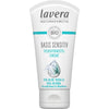 A white tube of Lavera Basis Sensitiv Feuchtigkeitscreme with nourishing aloe vera and jojoba for normal and combination skin. Rectangular soft plastic tube with a semi-matte finish; blue and grey accent graphics; upright orientation; clear sans-serif label text in black and blue; flat white cap at bottom. Plain, light background. No people or hands visible. Studio-style product shot.