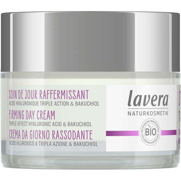 A jar of Lavera Naturkosmetik Firming Day Cream with hyaluronic acid and bakuchiol, featuring bio-certified ingredients for effective daily skincare. The label displays text in multiple languages, emphasizing its natural formulation. The round jar has a white plastic lid and clear base with a matte finish. Product name appears in sans-serif type; shot is close-up on a plain white background.