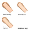 Lily Lolo mineraalimeikkipuuteri SPF15; kolme meikkivoiteen sävynäytettä nimillä Warm Honey, Warm Peach ja Popcorn soikeina, kermaisina ja satiinihohtoisina siveltyinä valkoisella taustalla; oikeassa alakulmassa suomenkielinen teksti "Lämpimät sävyt"; ei pakkausta.