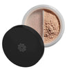 A round container of loose powder foundation with a black lid, partially open to reveal light beige mineral powder inside. The lid is solid black with a matte finish, no visible logo or text. The container is transparent plastic, smooth surface. No people or hands present. Background is plain white. Product shown in close-up shot, centered in frame.