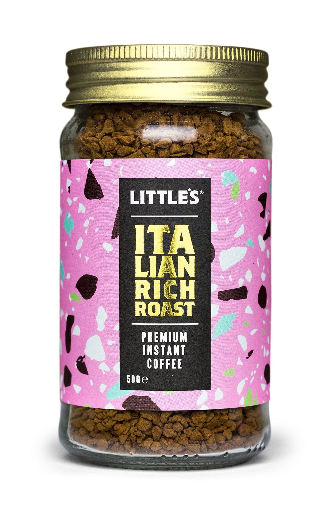 A glass jar of Littles Italian Rich Roast premium instant coffee with a round shape, transparent sides showing brown freeze-dried granules, topped with a metallic gold screw-on lid. The front label is glossy, mostly pink with multicolored accents and bold sans-serif text. Legible text includes product name and “50g.” The setting is neutral; no people or hands are present. Full product visible in the frame.