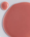 Madara BOOST Hyaluronic Collagen Hyaluronihapposeerumi; lähikuva vaaleanpunaisen seerumin koostumuksesta