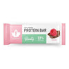 A Puhdistamo protein bar wrapper with a raspberry on chocolate, labeled Kollageeni Protein Bar Beauty, 32% proteiinia, and Vadelma, featuring a white, pink, and green design. The rectangular wrapper is glossy with bold sans-serif text. The image is a direct front-facing product shot on a plain background. No people or hands are present in the composition.