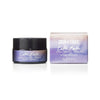 A jar and box of Skin & Tonic Calm Balm are displayed. The packaging has a purple and cream gradient design with a matte finish. Both jar and box are rounded edges; the box is rectangular, the jar is cylindrical with a screw lid. Typeface on the label is sans-serif, clear, and evenly spaced. Visible text includes lavender, chamomile, calendula, 20g (0.7 oz). No people or hands present. White background in studio shot setup.