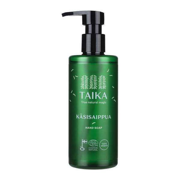 A green plastic pump bottle of Taika hand soap with a matte finish. The bottle is cylindrical with a black plastic pump dispenser. The label displays white text in clean, sans-serif font, along with stylized tree graphics and natural-themed design elements. Product type and brand name are legible on the front. No people or hands are present. Studio background, evenly lit shot. A green pump bottle of Taika hand soap, featuring white text, tree graphics, and natural-inspired design on the label.