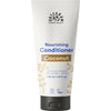 Urtekram Nourishing Conditioner Coconut, 180 ml; valkoinen putkilo sinisin ja kultaisin tekstein ja symbolein, jotka viestivät luomu- ja vegaanisertifioinnista sekä ravitsevaa kookosuutetta; mattapintainen, yksinkertainen lieriömäinen muoto ja pyöristetty kansi; groteskityyppiä; tuotetiedot keskitettynä etusivulle; vaalea tausta, ei ihmisiä tai käsiä.